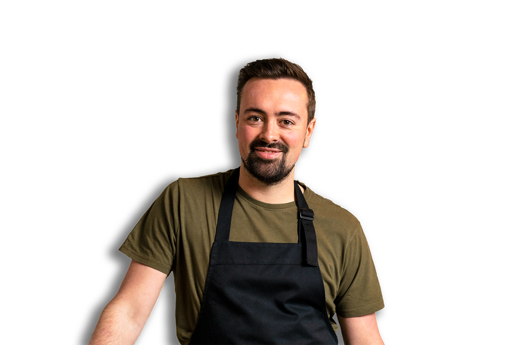 Tim wearing an apron